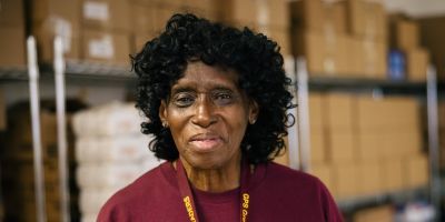A woman inside of a food bank.