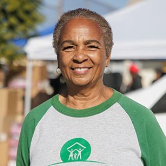 A woman smiling at the camera.